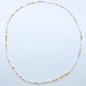 Unknown brand necklace yellow and white